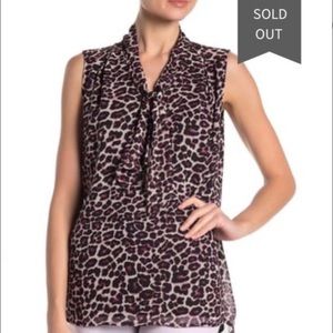Pleione, Animal print top